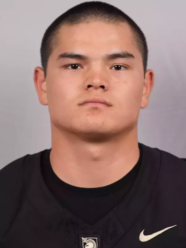 Nolan Johnson headshot with a Black Army Football jersey on.