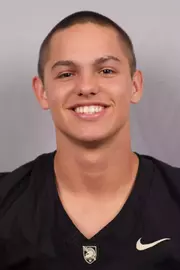 Luca Guerra headshot with a Black Army Football jersey on.