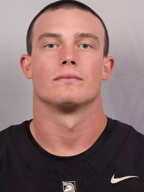 Jacob Mainord with a Black Army Football jersey on.