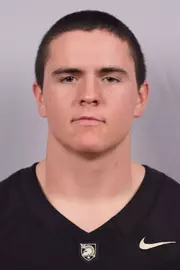 Xander Walker Headshot with a Black Army Football jersey on.