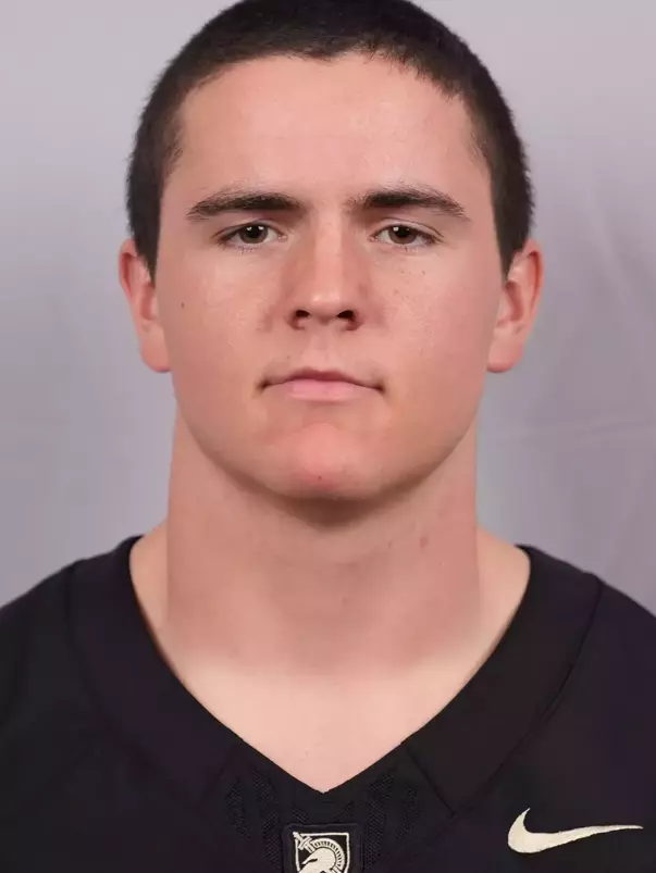 Xander Walker Headshot with a Black Army Football jersey on.