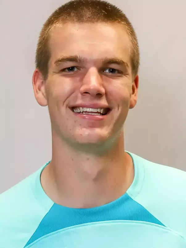 #0 Collin Gilbert Headshot with soccer uniform on.