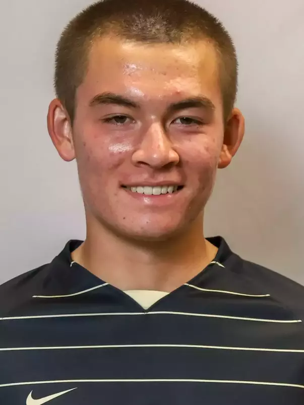 #12 Jacob Nguyen Headshot with soccer uniform on.