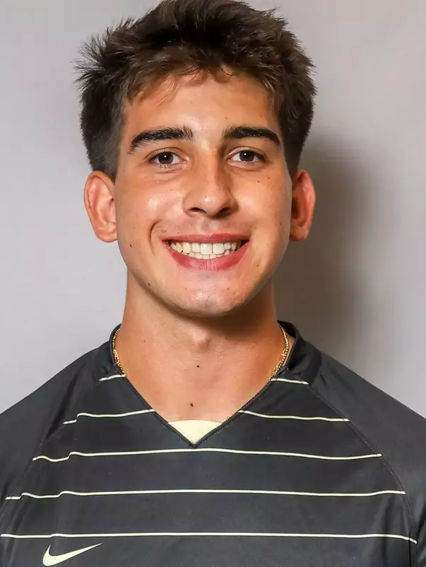 #13 Owen Mejia Headshot with soccer uniform on.