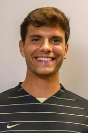 #15 Niko Kapustin Headshot with soccer uniform on.