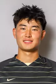 #21 Ronald Zhai Headshot with soccer uniform on.