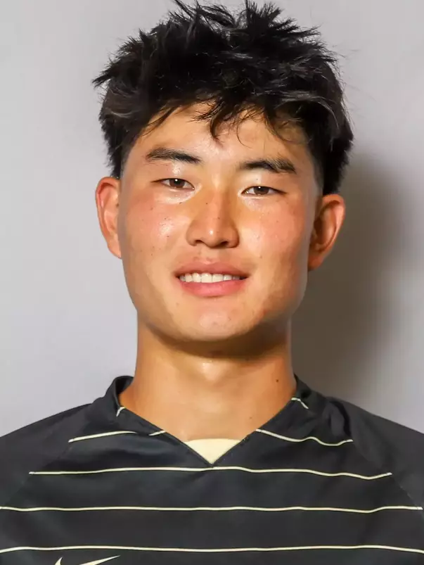 #21 Ronald Zhai Headshot with soccer uniform on.