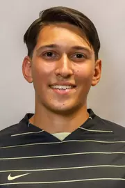 #27 Owen Tucker Headshot with soccer uniform on.