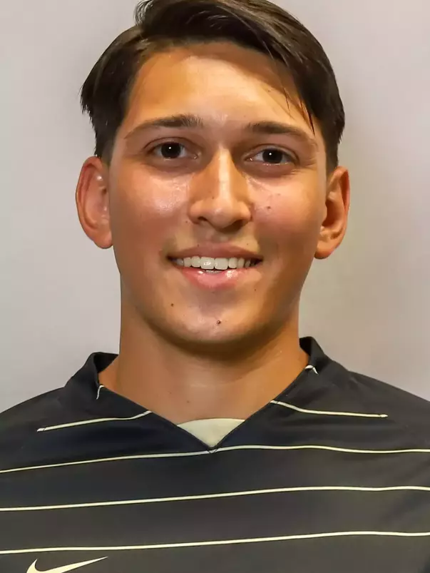 #27 Owen Tucker Headshot with soccer uniform on.