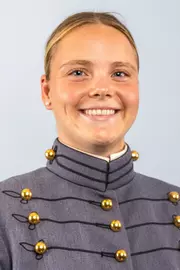 Kira MacMullan Headshot with Cadet full dress gray on.
