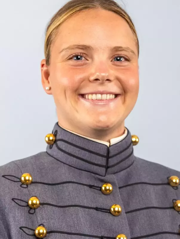 Kira MacMullan Headshot with Cadet full dress gray on.