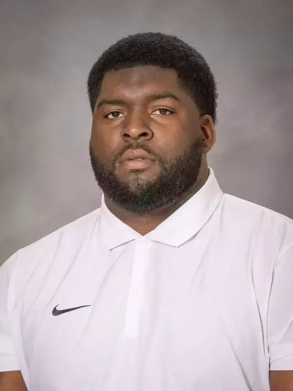 Jamiere Hogue headshot with a white polo on, assistant football coach