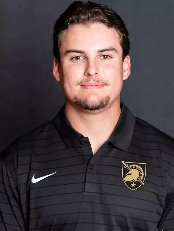 Christian Long Headshot with a black polo on.