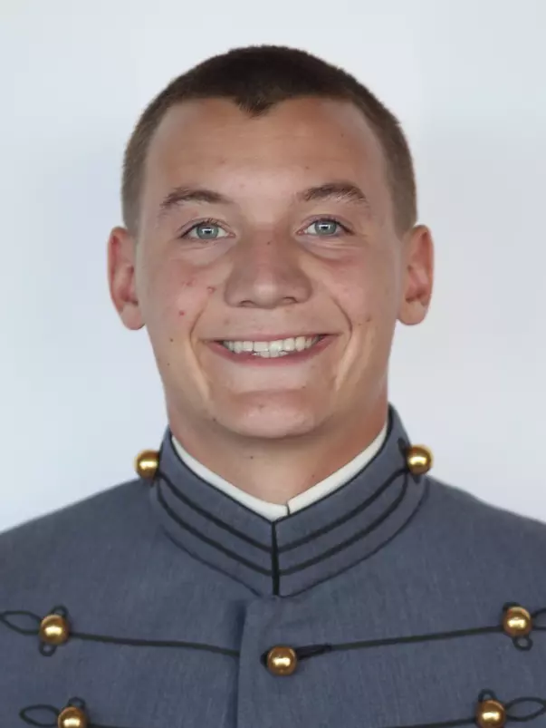 Matthew Archibald has his head shot photo taken.