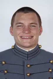 Kai Campbell has his head shot photo taken.
