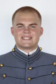 Brody Evans has his head shot photo taken.