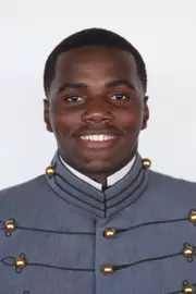 Elijah McFarland has his head shot photo taken.