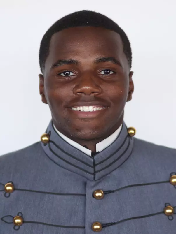 Elijah McFarland has his head shot photo taken.