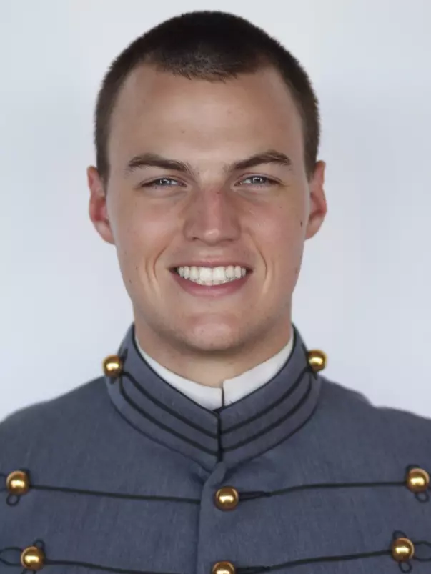 Nathan Olivier has head shot photo taken.