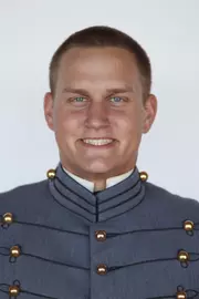 Jace Schmidt has his head shot photo taken.