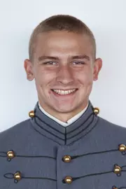 Drew Vandermeulen has his head shot photo taken.