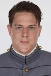 Dakoda Wagner has his head shot photo taken.