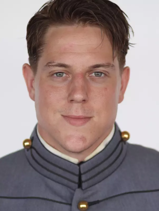 Dakoda Wagner has his head shot photo taken.