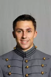 Billy Batten has his 2026-27 headshot photo taken.