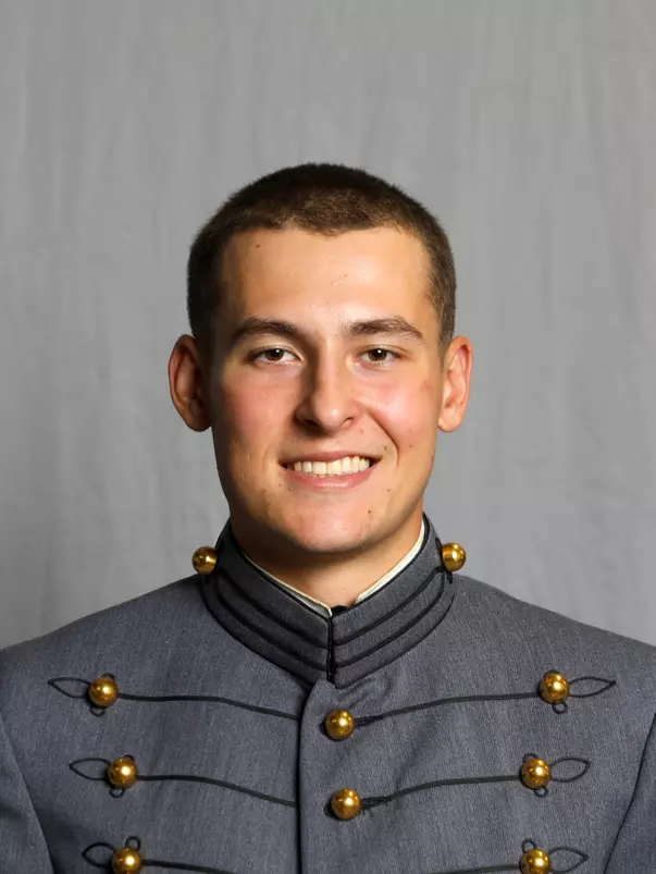 Cam Charron has his 2026-27 headshot photo taken.
