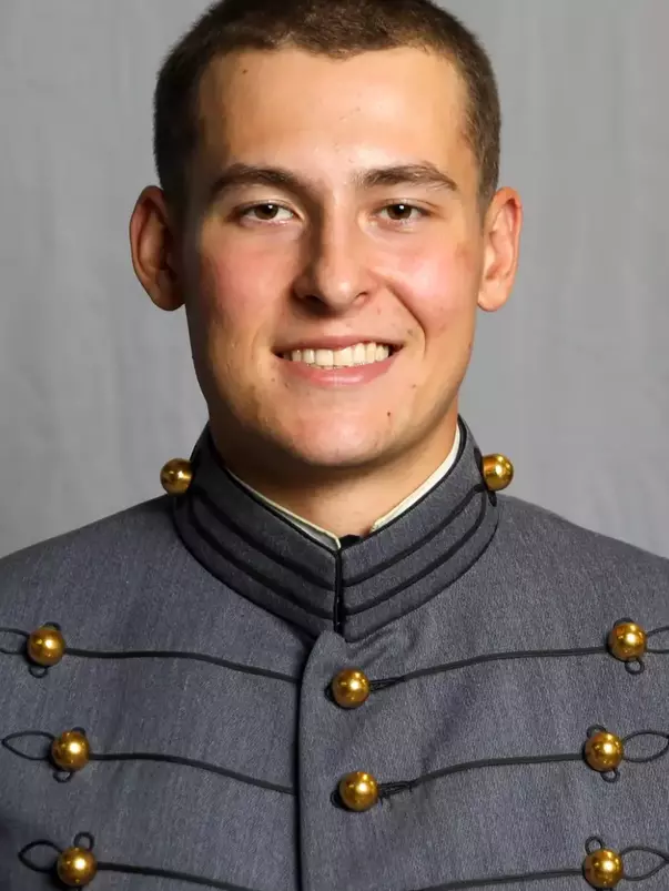 Cam Charron has his 2026-27 headshot photo taken.