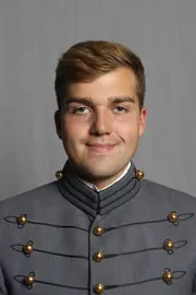 Gus Holt has his 2026-27 headshot photo taken.