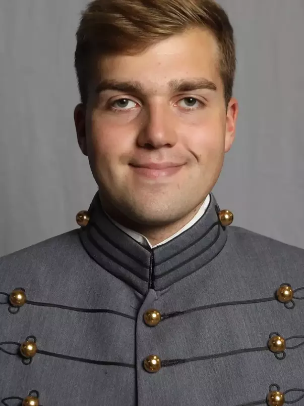 Gus Holt has his 2026-27 headshot photo taken.