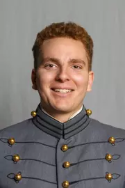 JJ Cataldo has his 2026-27 headshot photo taken.