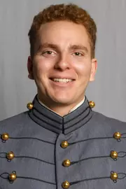 JJ Cataldo has his 2026-27 headshot photo taken.