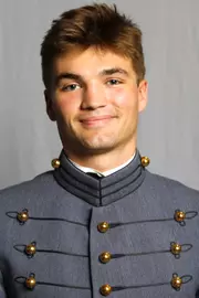 Liam Chapman has his 2026-27 headshot photo taken.