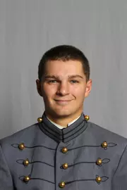 Max Holland has his 2026-27 headshot photo taken.