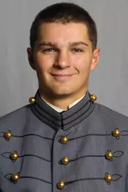 Max Holland has his 2026-27 headshot photo taken.