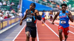Tyriq Brunn runs in the 4x100 relay at the NCAA Outdoor Track Championships in Eugene, Oregon