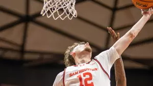 Matt Dann rebounds a missed shot against Biblical Studies