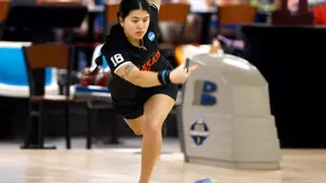 Breana Chewens rolls at the NCAA Rochester Regional