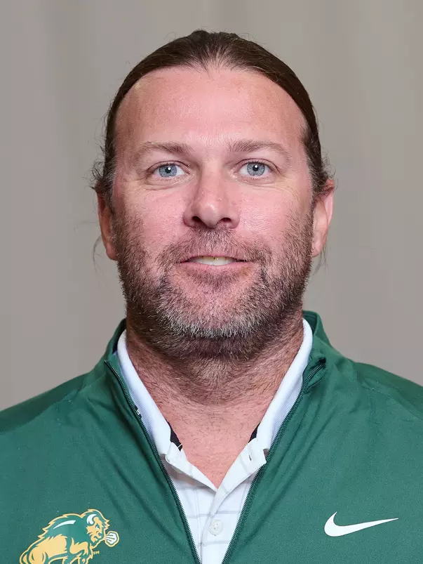 Head Cross Country Coach Dennis Newell
