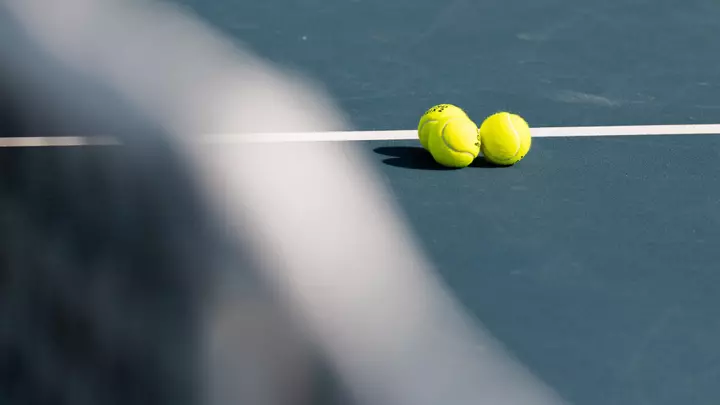 tennis balls on court