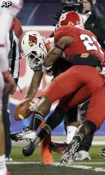 Louisville Nearly Comes Back, Falls Short in Belk Bowl 31-24