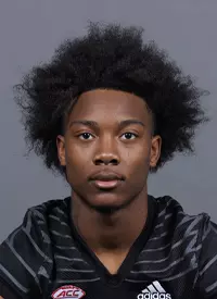 FB: Ahmari Huggins-Bruce breaks a tackle