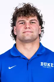 Luke Mergott's 2025 headshot