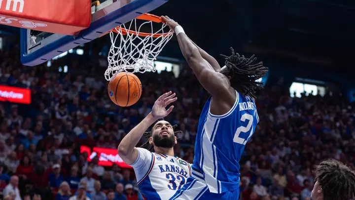 Patrick Ngongba II dunks at Kansas in exhibition game.