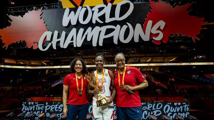 Kara Lawson, Chelsea Gray and Tia Jackson pose with their gold medals at FIBA World Cup