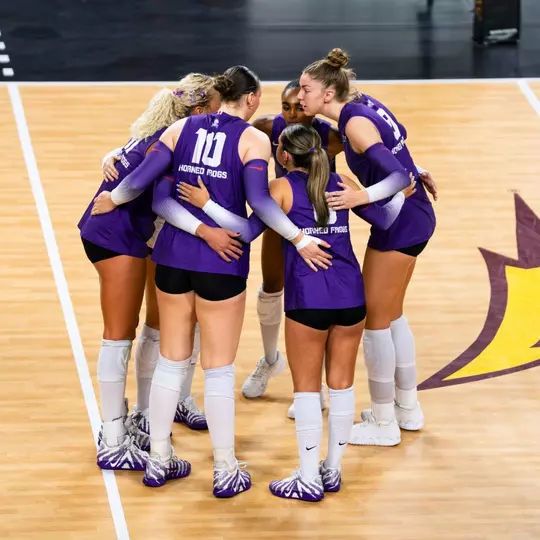 TCU huddles on the court at Arizona State