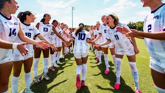 Kamdyn Fuller running through starting XI tunnel