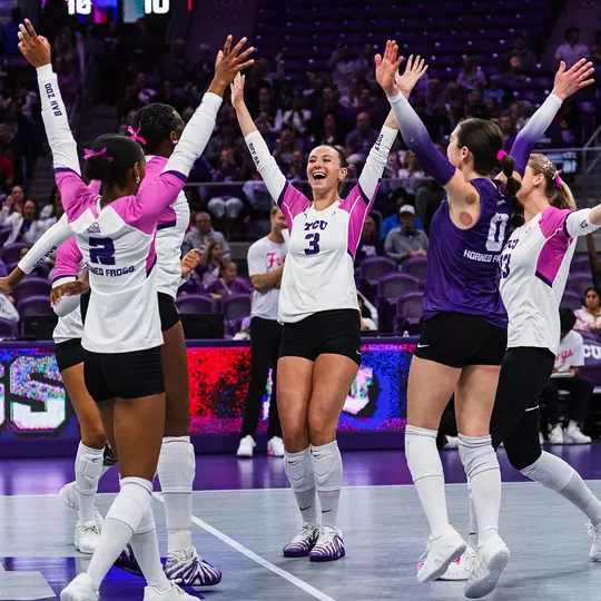 TCU Volleyball celebrates against Texas Tech